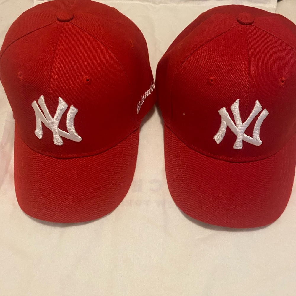 Red NY Logo Baseball Caps